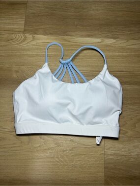 Women's White Sports Bra with Light Blue Strappy Back
